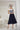 Invitations by Veni 29516 - Ivory and navy off the shoulder a-line dress - Mother of the Bride A-line Dress | Sean Rayment Manchester