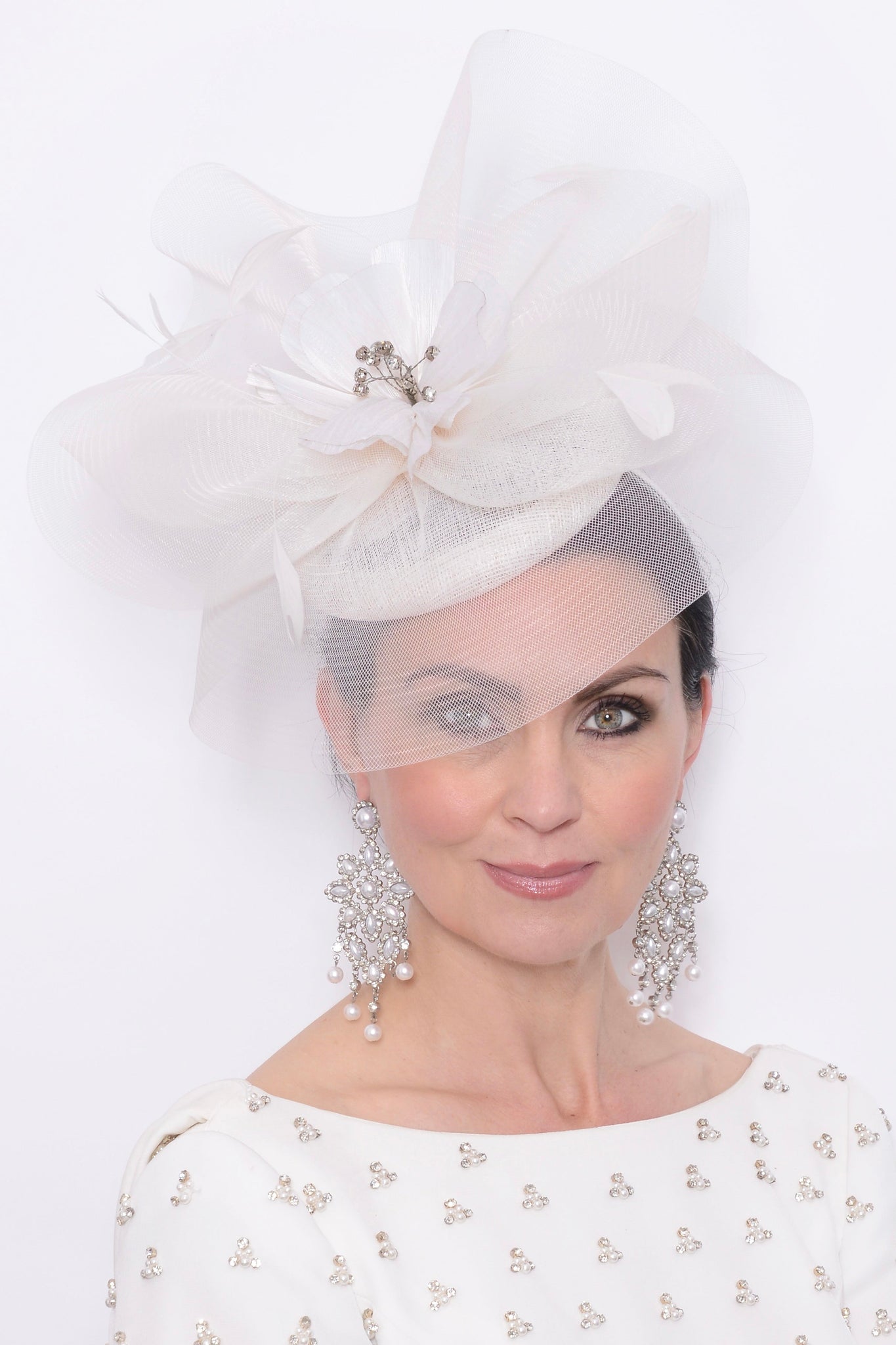 Woman wearing Snoxell Gwyther 2045 - Ivory, suitable for weddings and special occasions